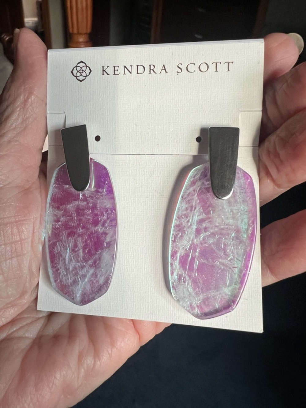 Kendra Scott Aragon silver/dichroic amethyst earrings.